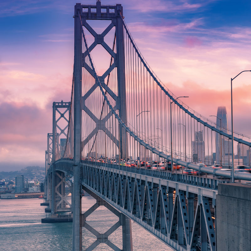 View from the height of Oakland Bridge in San Francisco at sunset